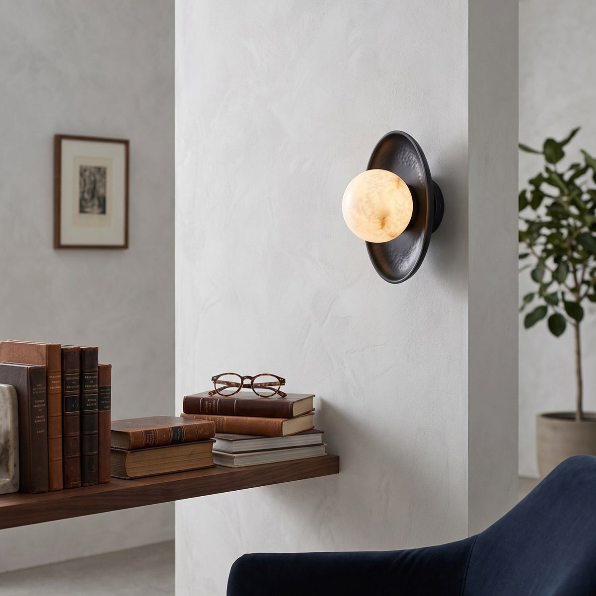 Aosta Disc Alabaster Wall Sconce — additional product view, a stone globe in front of a textured brass disc (view 3)