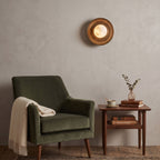 Aosta Disc Alabaster Wall Sconce — additional product view, a stone globe in front of a textured brass disc (view 4)