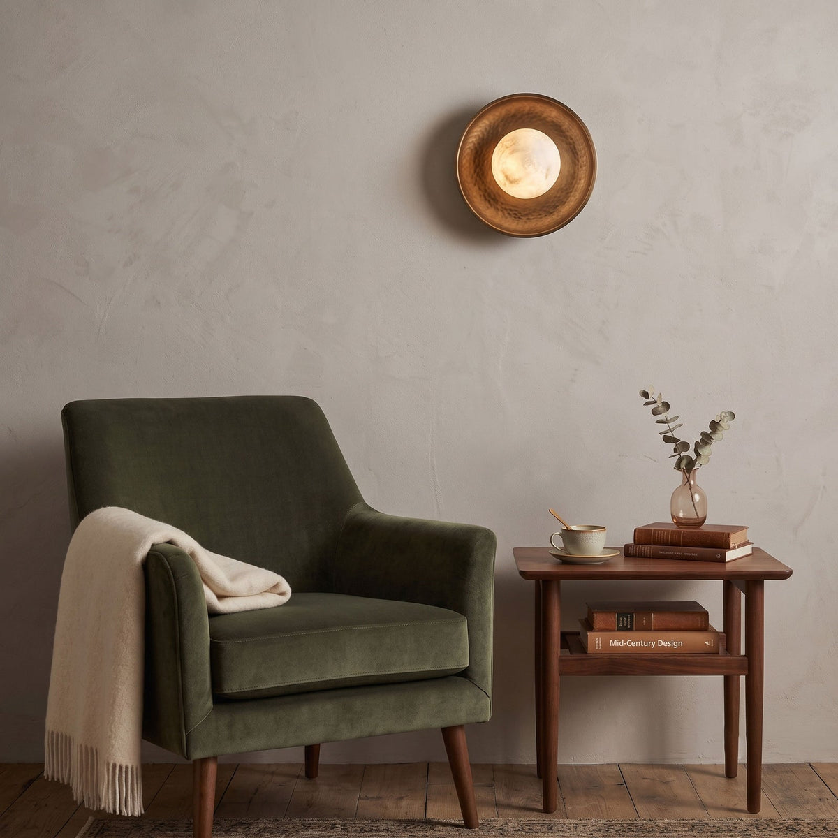 Aosta Disc Alabaster Wall Sconce — additional product view, a stone globe in front of a textured brass disc (view 4)