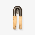 Arc Ridge Alabaster Wall Sconce — full fixture profile, two ribbed stone columns joined by a curved metal arch (view 1)