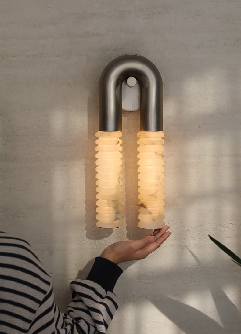 Arc Ridge Alabaster Wall Sconce — additional product view, two ribbed stone columns joined by a curved metal arch (view 3)