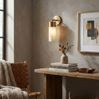 Aurelia Alabaster Cylinder Wall Sconce — product setting and fixture profile, a cylindrical stone shade carried by a compact wall arm (view 2)