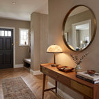 Baxter Alabaster Table Lamp — product setting and fixture profile, a stone dome with geometric bronze-colored trim (view 2)