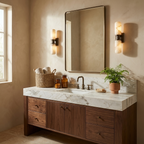 Bobbin Alabaster Wall Sconce — product setting and fixture profile, two rounded stone cylinders joined by a spool-shaped metal hub (view 2)