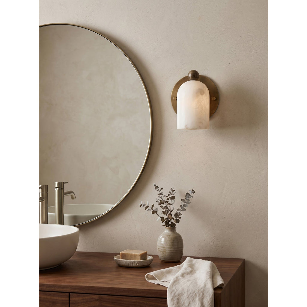 Bombelles Alabaster Wall Lamp — additional product view, a domed stone shade against a round metal backplate (view 5)