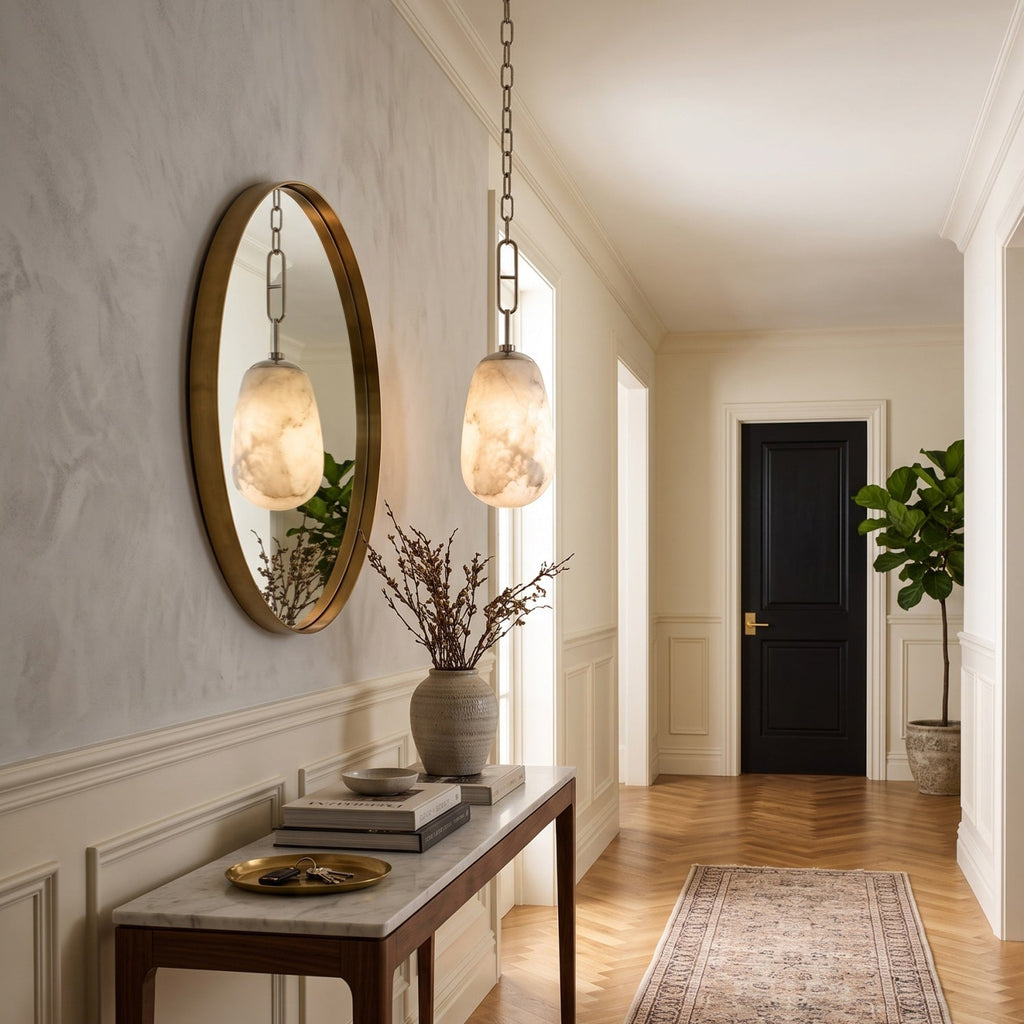 Bruckner Alabaster Pendant Lamp — additional product view, a teardrop-shaped stone shade on a brass link chain (view 4)