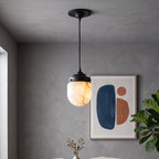 Dome-topped Alabaster Pendant Lamp — additional product view, a dome-topped stone shade beneath stepped brass hardware (view 3)