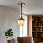 Dome-topped Alabaster Pendant Lamp — additional product view, a dome-topped stone shade beneath stepped brass hardware (view 4)