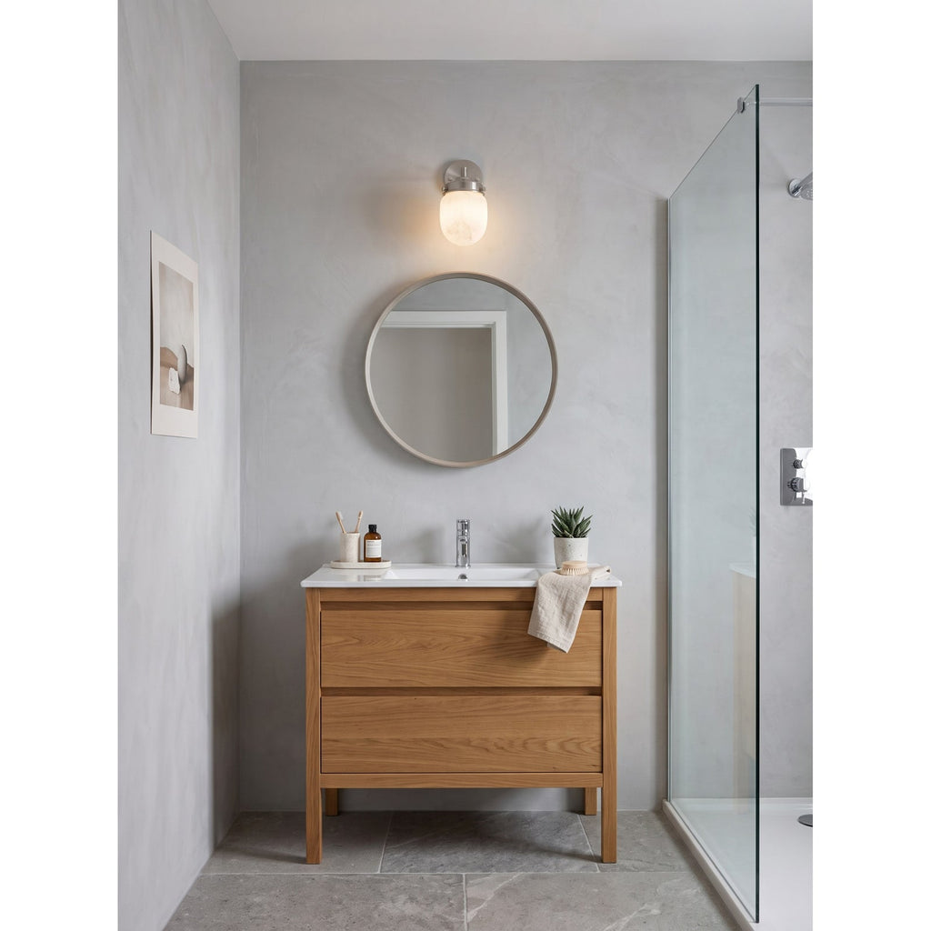 Bullet-shaped Alabaster Wall Sconce — additional product view, a bullet-shaped stone shade within stepped metal fittings (view 3)