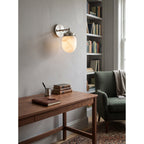 Bullet-shaped Alabaster Wall Sconce — additional product view, a bullet-shaped stone shade within stepped metal fittings (view 4)