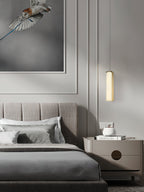 Chaos Alabaster Pendant Light — additional product view, a slender stone cylinder suspended on fine cables (view 5)