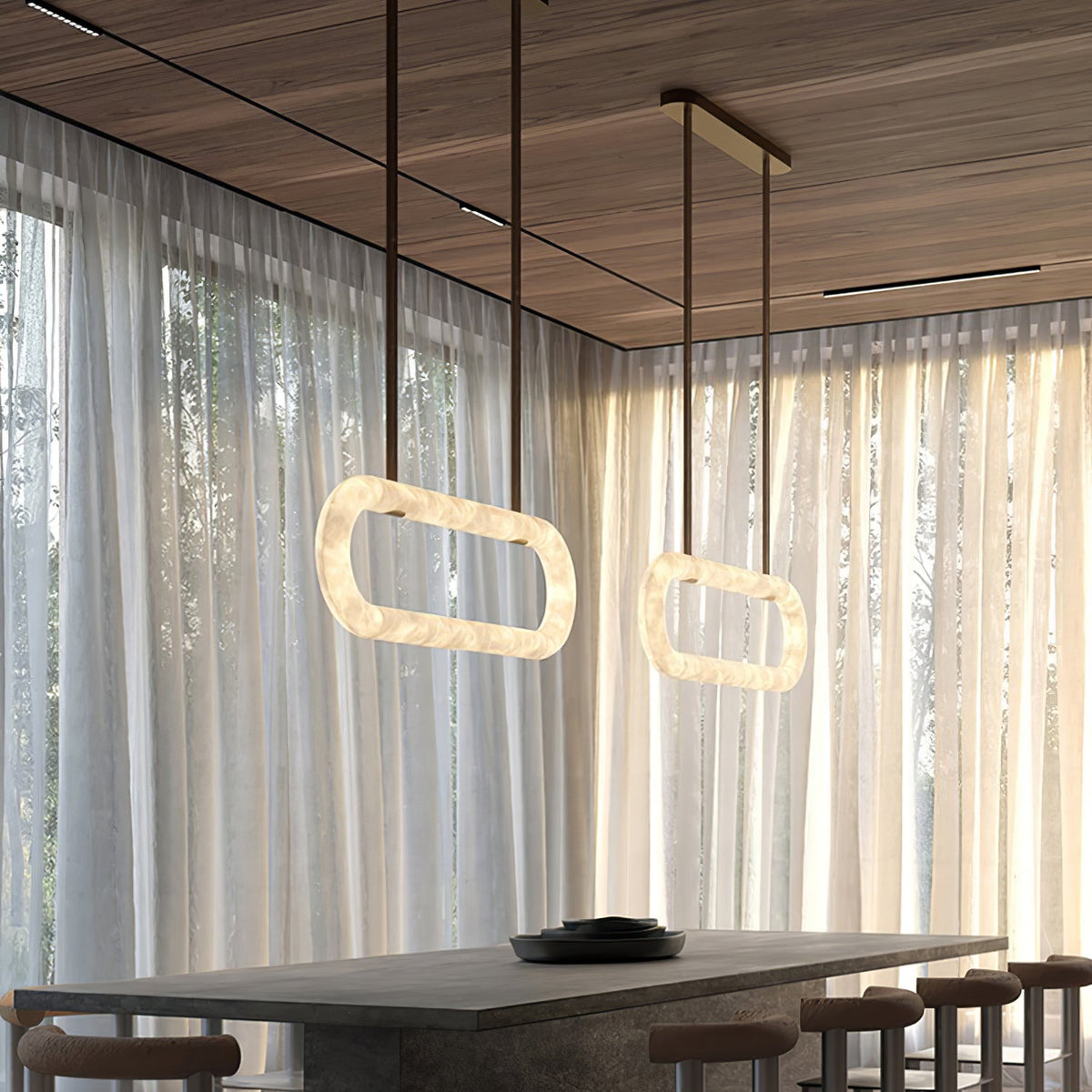 Circle Alabaster Chandelier — product setting and fixture profile, an elongated stone loop suspended by leather-look straps (view 2)