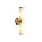 Crestmoor Vanity Alabaster Sconce — full fixture profile, two stone cylinders at opposite ends of a brass frame (view 1)