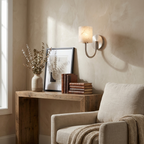 Crook Alabaster Wall Sconce — product setting and fixture profile, a cylindrical stone shade beneath a hook-shaped arm (view 2)