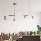 Cumulus Alabaster Chandelier — additional product view, four globe shades beneath a gently arched bar (view 4)