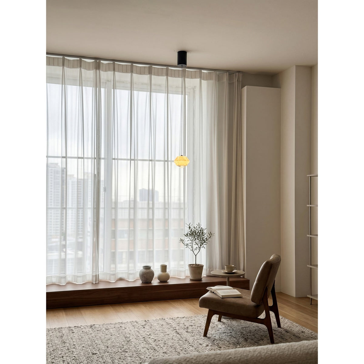Diamante Alabaster Pendant Lamp — additional product view, a faceted stone body with a crystal detail at its base (view 4)