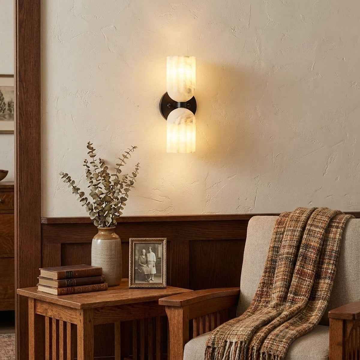 Dual Alabaster Ribbed Wall Sconce — product setting and fixture profile, two ribbed stone shades on a metal wall mount (view 2)