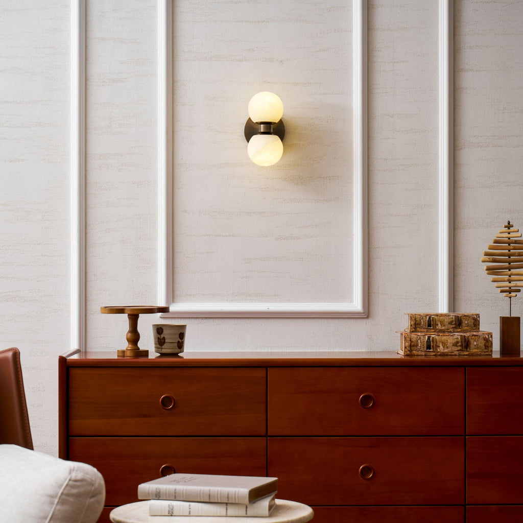 Dual Globe Alabaster Wall Lamp — additional product view, two rounded stone shades on a brass wall mount (view 3)