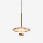 Eclipse Alabaster Pendant Lamp — full fixture profile, a flat stone disc suspended from a slender metal rod (view 1)