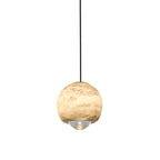 Ferox Alabaster Pendant Light — full fixture profile, a stone body with a lens-like lower diffuser (view 1)