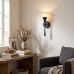Flare Alabaster Wall Sconce — product setting and fixture profile, an open stone shade above a tapered hourglass stem (view 2)