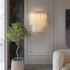 Fractured Alabaster Wall Sconce — product setting and fixture profile, two rows of stone panels in a contrasting metal frame (view 2)