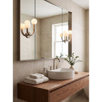 Happy Alabaster Wall Sconce — additional product view, rounded stone globes on a geometric wall frame (view 3)