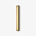 Isolde Alabaster Wall Sconce — full fixture profile, a smooth stone diffuser on a compact metal wall mount (view 1)