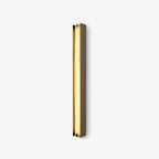 Isolde Alabaster Wall Sconce — full fixture profile, a smooth stone diffuser on a compact metal wall mount (view 1)