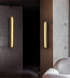 Isolde Alabaster Wall Sconce — additional product view, a smooth stone diffuser on a compact metal wall mount (view 3)