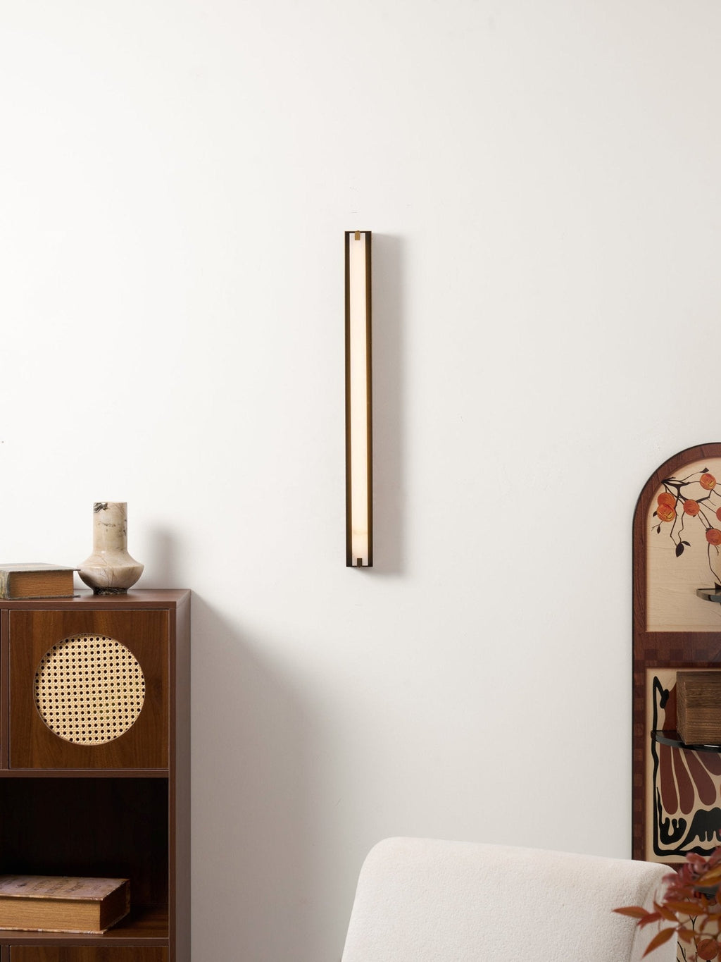 Isolde Alabaster Wall Sconce — additional product view, a smooth stone diffuser on a compact metal wall mount (view 4)