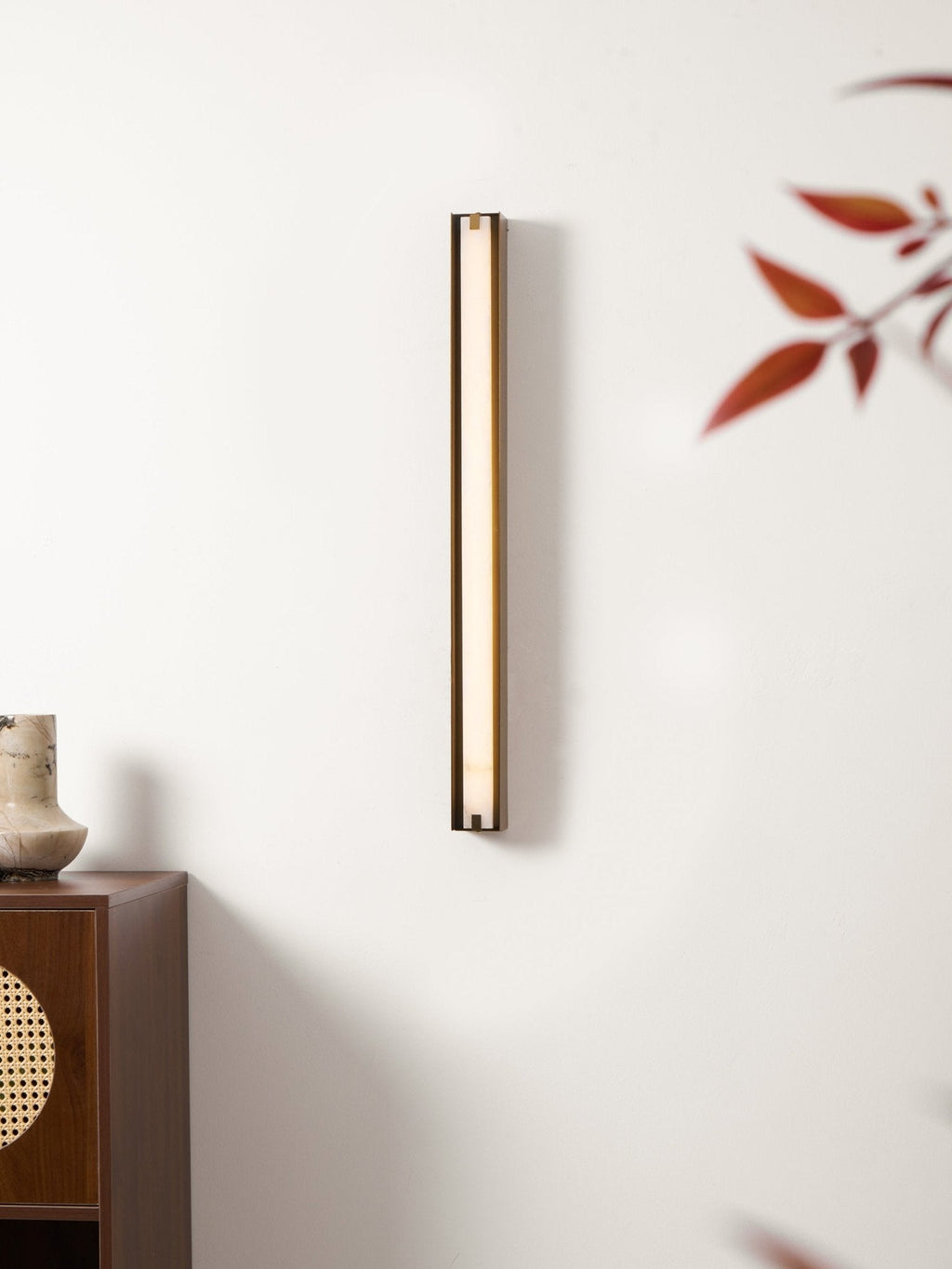Isolde Alabaster Wall Sconce — additional product view, a smooth stone diffuser on a compact metal wall mount (view 5)