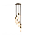 Junio Alabaster Chandelier — full fixture profile, stone cylinders suspended beneath bronze-colored caps (view 1)