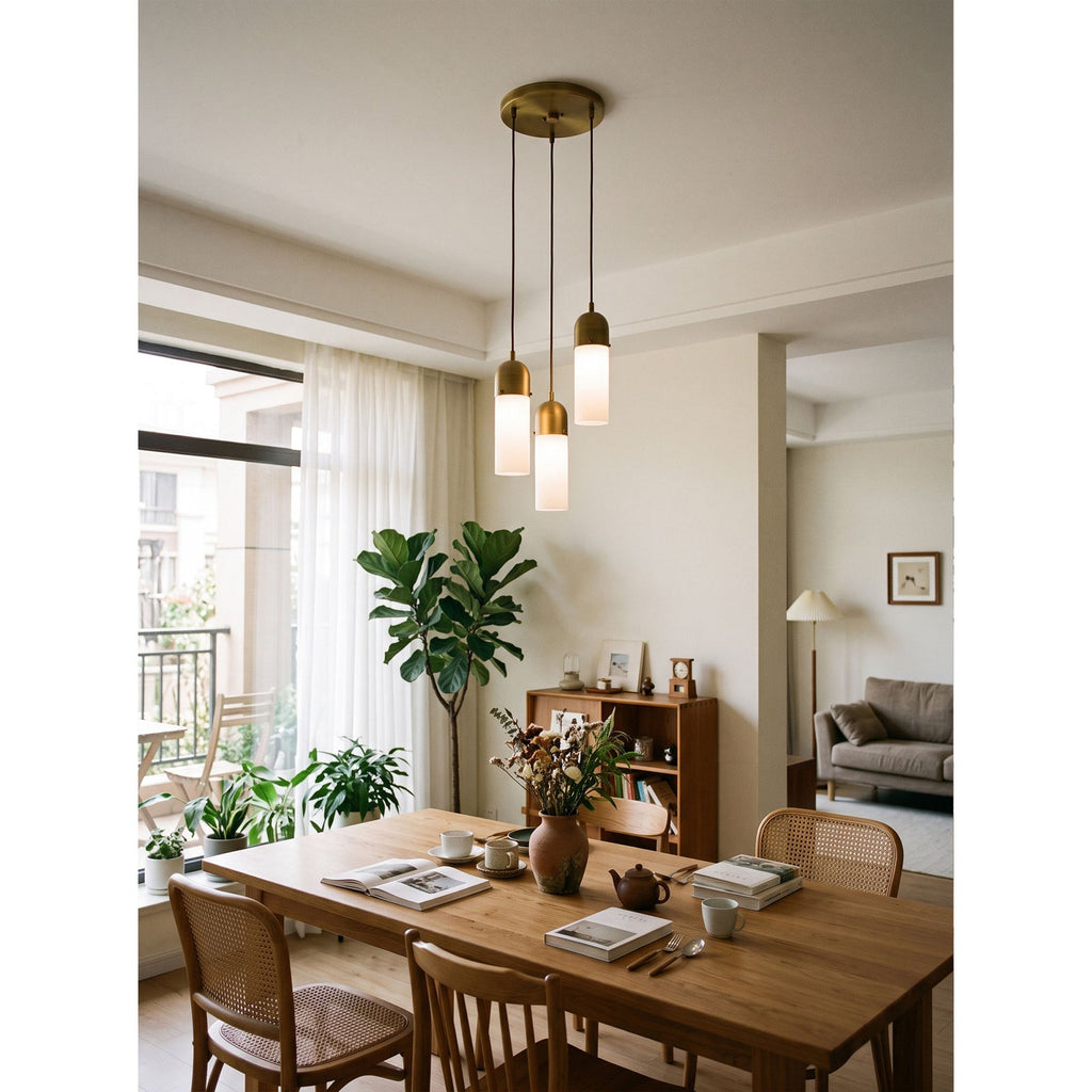 Junio Alabaster Chandelier — additional product view, stone cylinders suspended beneath bronze-colored caps (view 5)
