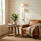 Liora Alabaster Double Globe Wall Sconce — product setting and fixture profile, two stone globes on a slender vertical rod (view 2)
