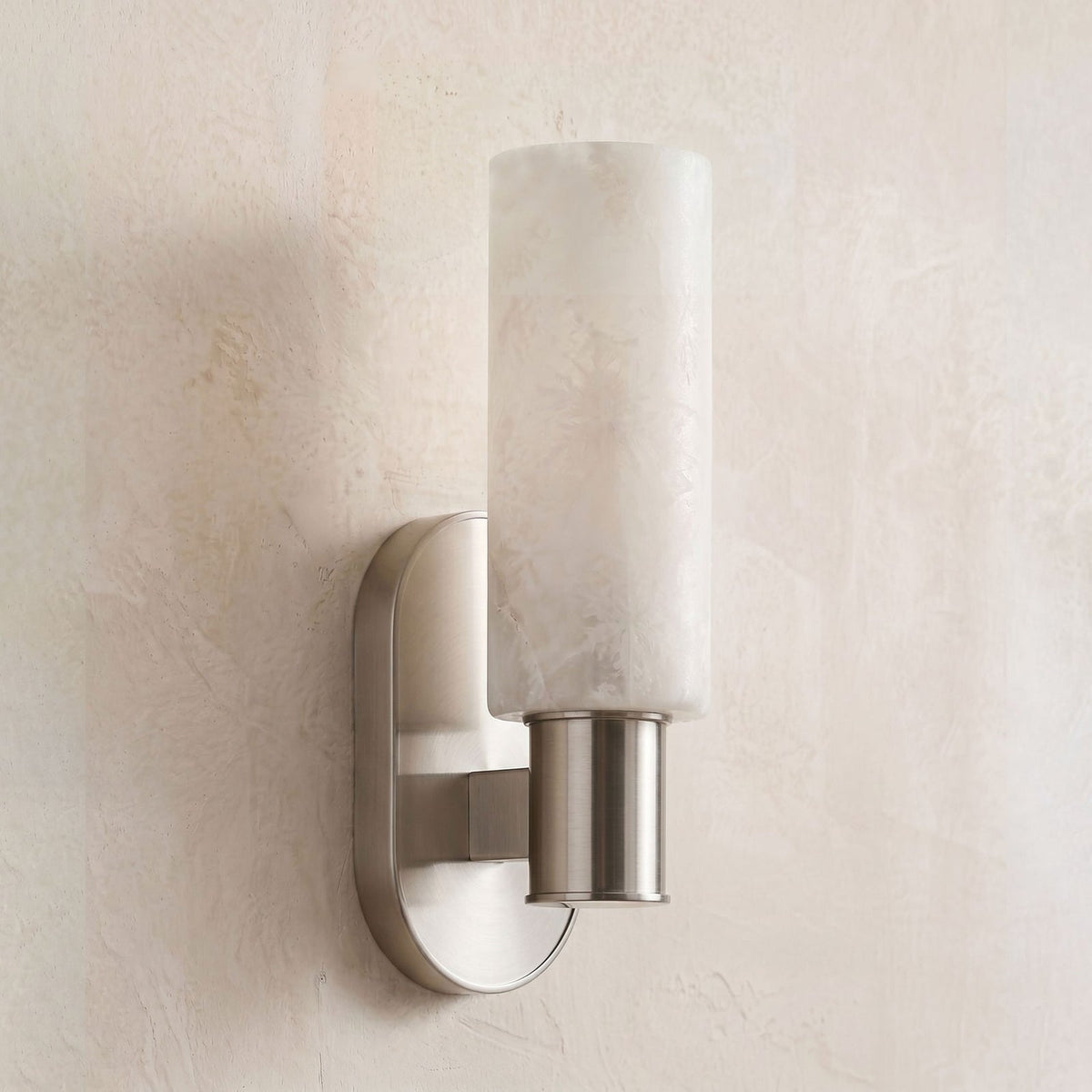 Ludlow Alabaster Wall Sconce — additional product view, a cylindrical stone shade on a short straight wall arm (view 3)
