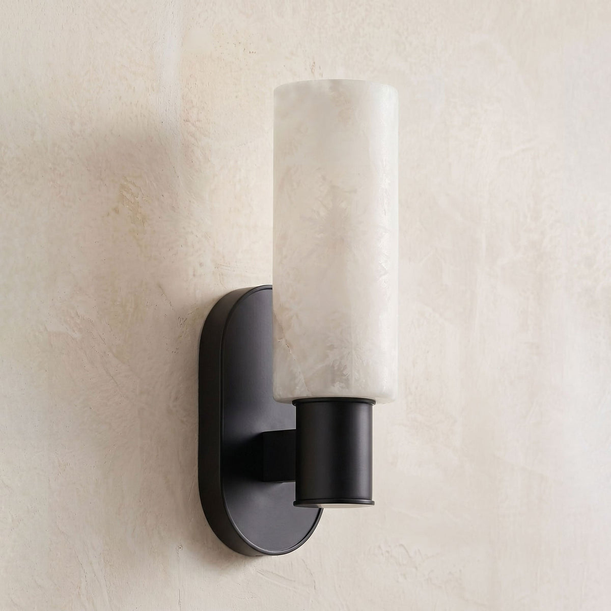Ludlow Alabaster Wall Sconce — additional product view, a cylindrical stone shade on a short straight wall arm (view 4)