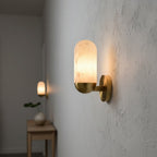 Lumeers Alabaster Wall Lamp — additional product view, a capsule-shaped stone diffuser with brass fittings (view 3)