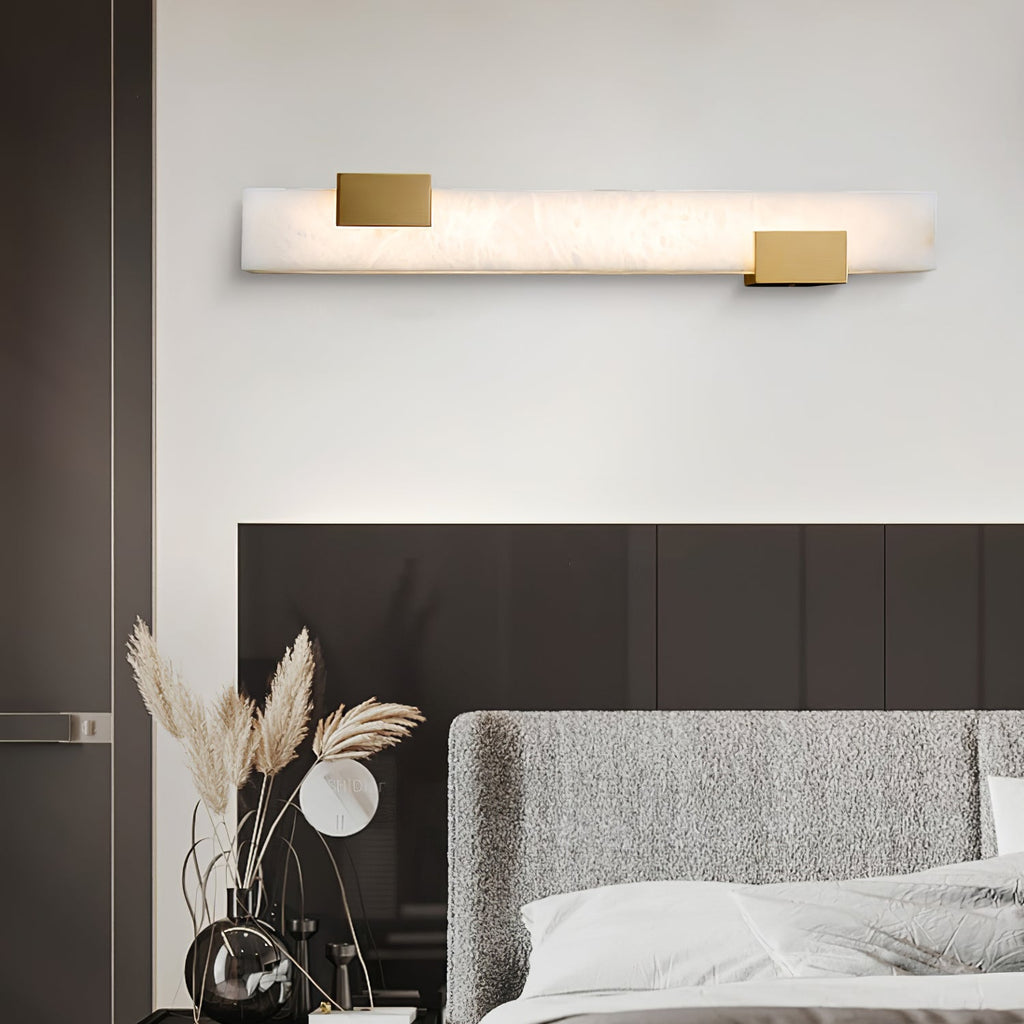 Lumen Bar Alabaster Wall Sconce — product setting and fixture profile, a slender stone column framed by brass accents (view 2)