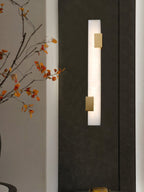 Lumen Bar Alabaster Wall Sconce — additional product view, a slender stone column framed by brass accents (view 4)