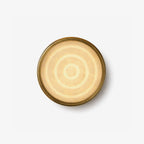 Orlina Stone Disc Wall Sconce — full fixture profile, a shallow circular stone diffuser on a metal wall mount (view 1)