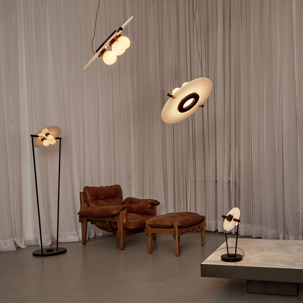 Magma Alabaster Pendant Lamp — additional product view, stone discs within a dark metal frame (view 3)