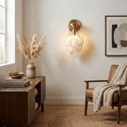 Magnolia Alabaster Disc Sconce — product setting and fixture profile, five stone discs suspended beneath a round wall plate (view 2)