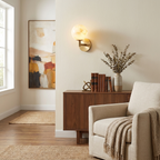 Marbella Alabaster Wall Sconce — product setting and fixture profile, a stone globe on a short jointed wall arm (view 2)