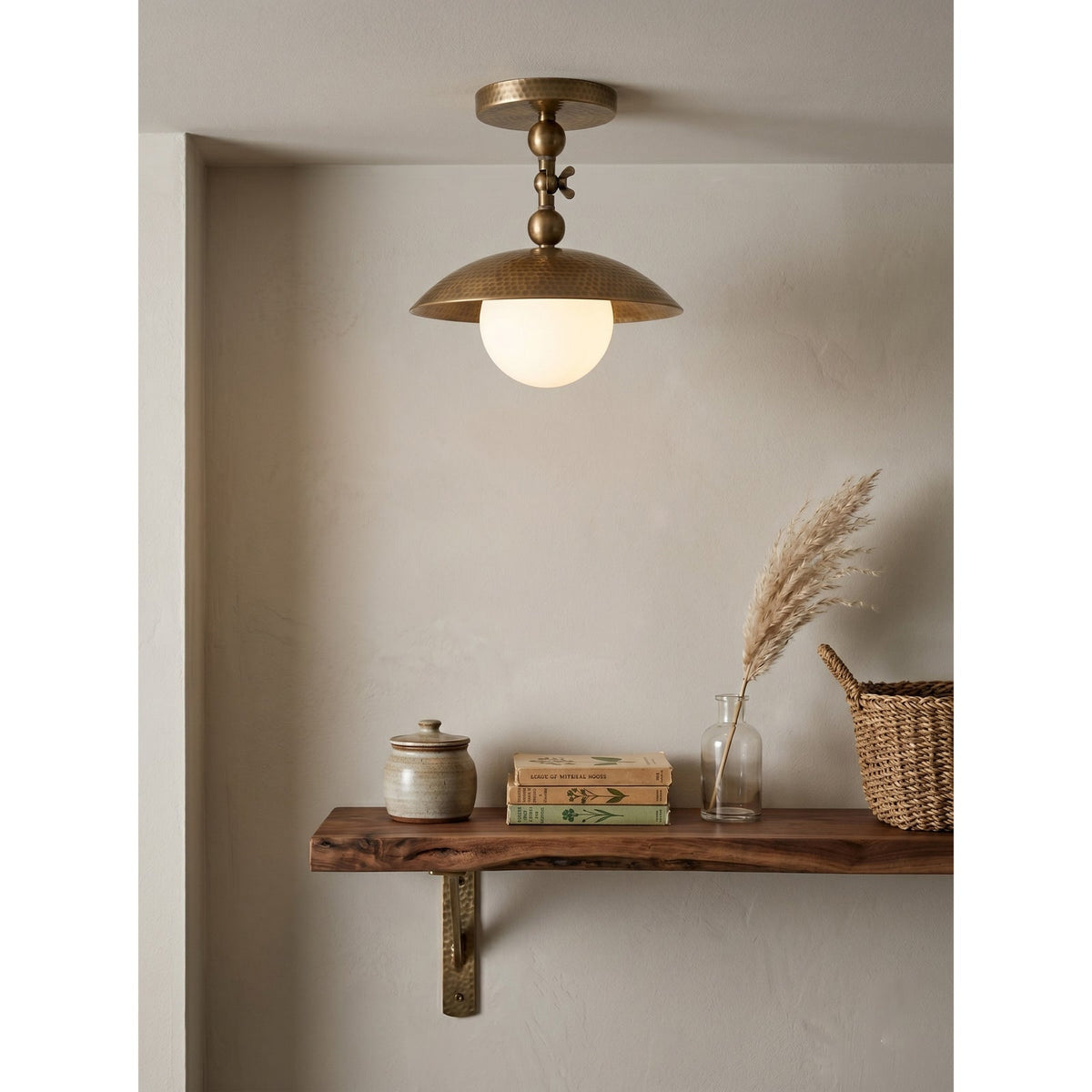 Marie Petite Hammer Pattern Flush Mount — additional product view, a stone globe beneath a textured brass dome (view 3)