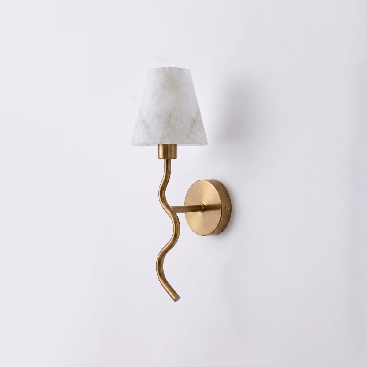 Meander Alabaster Cone Sconce — additional product view, a stone cone above a serpentine metal arm (view 4)
