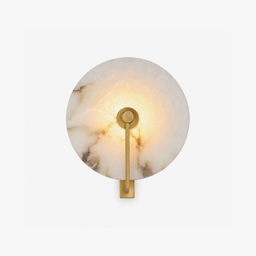 Medallion Alabaster Wall Sconce — full fixture profile, a round stone disc crossed by an angular metal arm (view 1)