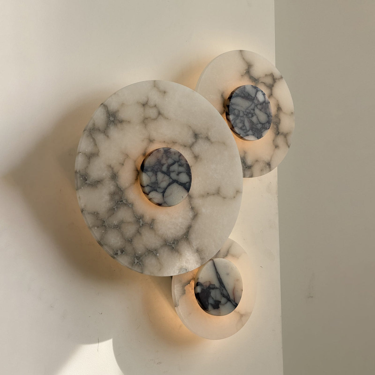Median Combination Alabaster Wall Lamp — product setting and fixture profile, stone lighting elements combined on a wall mount (view 2)