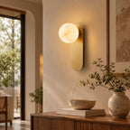 Mira Alabaster Globe Wall Sconce — additional product view, a rounded stone shade on a compact vertical mount (view 5)