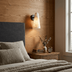 Mira Solo Alabaster Cone Wall Sconce — product setting and fixture profile, a tapered stone shade on a compact wall mount (view 2)